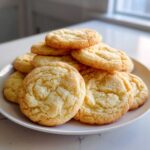 A stack of freshly baked, chewy Classic Vanilla Sugar Cookies coated in granulated sugar.