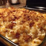 Close-up of a baked Chicken Bacon Ranch Casserole with a crispy, golden breadcrumb and bacon topping.