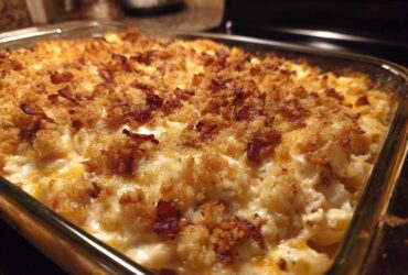 Close-up of a baked Chicken Bacon Ranch Casserole with a crispy, golden breadcrumb and bacon topping.